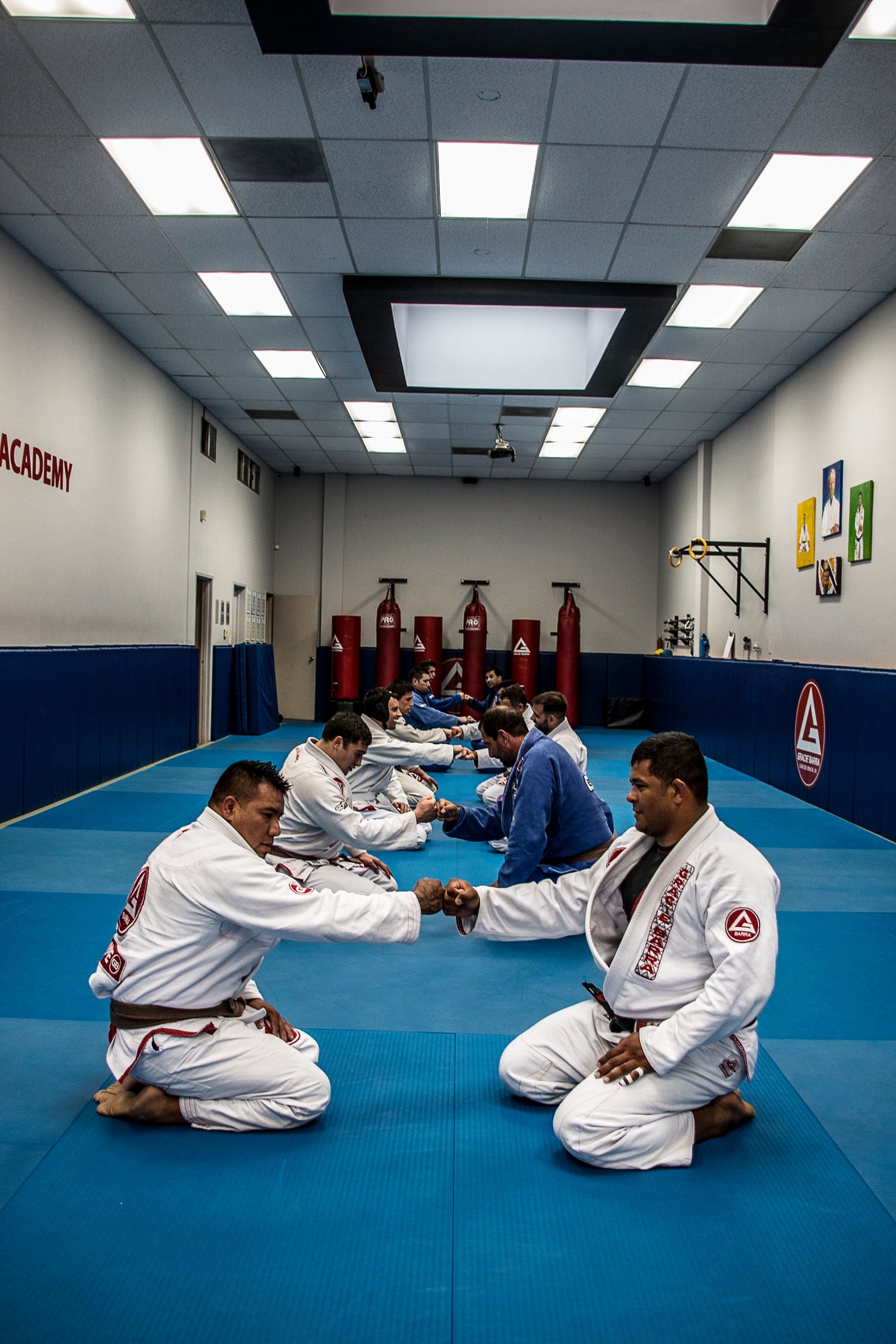 Thiago Reinaldo fist bumping a training partner during class at Gracie Barra Santa Barbara