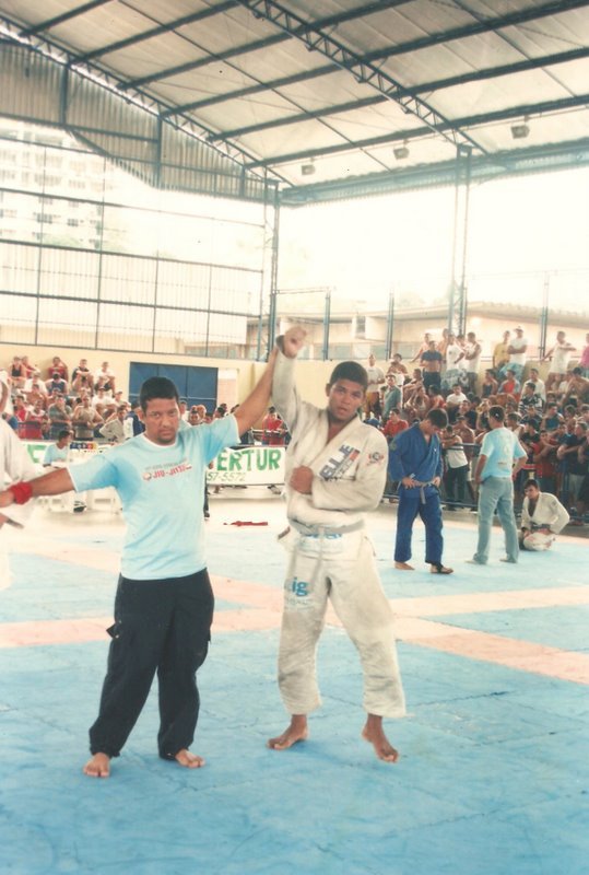 Thiago Reinaldo having his hand raised after a victory during his blue belt years